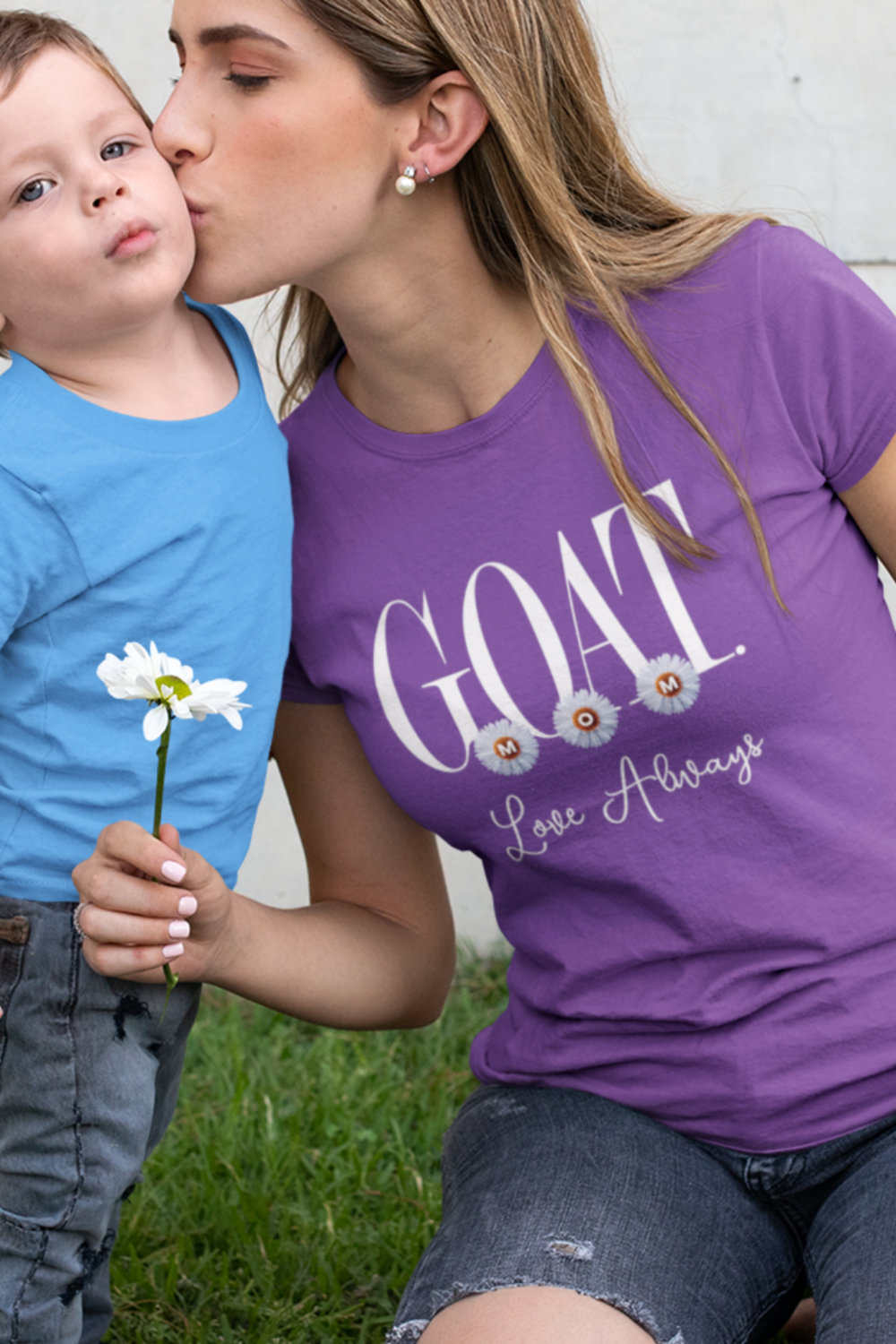 G.O.A.T. (Greatest Of All Time) mom with daisies art on t-shirt